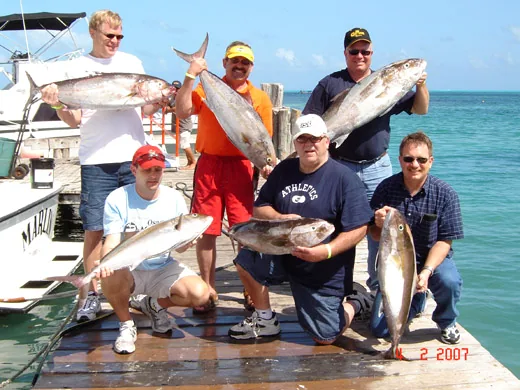 Anglers sharing a 6-hour boat charter while deep sea fishing in Cancun